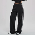 Black wide-leg track pants with double white side stripes and high elastic waist - S / Black and White