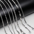 Five assorted silver stainless steel chain necklaces including box and snake styles - 7-Piece Set / Silver