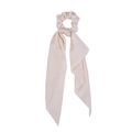 Detailed close-up of a soft beige satin hair scrunchie with long elegant ribbon streamers - Crinkled Beige