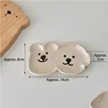 Cute ceramic bear-shaped sauce dish with dual compartments in cream white finish - Beige Bear & Dog Double Jointed Dish