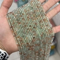Faceted light green natural gemstone beads 2-3mm with orange inclusions for jewelry - Arusha Sunstone 3mm