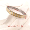Two-tone gold and silver stretch stainless steel bracelet with 8mm width dimensions - J015-1 Silver Gold Stripes