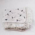 Detail of embroidered dandelion pattern on soft muslin cotton baby blanket with tassels - 80x65cm / Dandelion