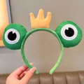 Cute green plush frog headband with yellow crown detail for hair styling and face washing - Crown Big Eyed Frog