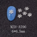 Detail of snowflake nail charm with rhinestone, 6x6.5mm size on blue nail plate - Silver Mini Rhinestone Snowflake Style (A596)