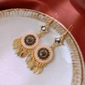 Detail of vintage gold earrings with black gemstone, pearls, and leaf fringe tassels - Gold Leaf Tassel Ear Hook (8#)