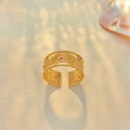 Detail of adjustable gold ring with multi-row twisted texture and pink gemstones - Adjustable Open / Gold Pink Zirconia