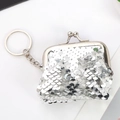Close-up of silver sequin coin purse pendant with metal frame, clasp and keychain ring - Silver + Silver