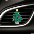 Cartoon Christmas tree air vent clip showing soft silicone texture on a car dashboard - Large Christmas Tree