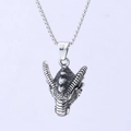Vintage stainless steel dragon head pendant necklace with detailed scales on purple background - Vintage Carved Dragon Head Style (F0206)