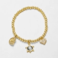 Goldfarbenes Perlenarmband mit Zirkonia-Herz, Opal-Schildkröte und Muschelanhänger - Grau