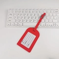 Red PU leather luggage tag with adjustable strap and ID information card on white desk - Stitched Frame No-Flip Style / Red