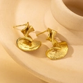 Vintage irregular golden leaf stud earrings with hammered texture on beige ceramic base - Ballet Fan Shape Stud Earrings