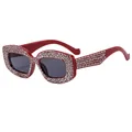 Sparkly red rhinestone sunglasses with dark lenses and rectangular starburst frames - Red Frame Grey Lens