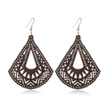Macro detail of drop-shaped dark brown wood earrings with geometric cutouts and metal hooks - Style 46