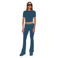 Women's blue two-piece set with a short sleeve crop top and flared pants on white background - Dark Blue