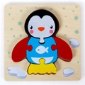 3D wooden penguin puzzle for children with colorful pieces and fish pattern on wood base - Penguin with Buckle