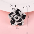 Close-up of a 25mm black enamel camellia flower charm with silver edges and tiny rhinestones - 1 Piece / D330 Single Small Camellia (Black)