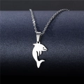 Polished stainless steel dolphin pendant necklace on a deep blue starry background - Dolphin
