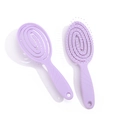 Light purple vented hair brush for detangling and styling, featuring a spiral hollow back - Oval Taro Purple