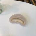 Top view of a beige minimalist half-moon hair claw clip on a clean white surface - Approx 7cm / Light Nude Pink