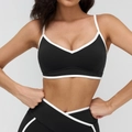 Sport-BH und Leggings Set in Schwarz-Weiß mit Kontrastpaspel und Kreuztaille - S / Premium Schwarz