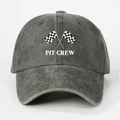 Close-up of washed dark gray cotton baseball cap with Pit Crew racing flag print - Army Green