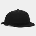 Close-up of black washed canvas short brim baseball cap with adjustable side strap - Adjustable / Black