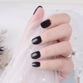 Detail of glossy black short square-round press-on nails on elegant lace background - Glossy Black (DFYL-01)