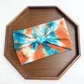 Orange and blue tie-dye extra wide yoga headband with a cute center knot detail - Blue Orange Tie-dye