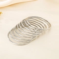 Polished silver stackable stainless steel wire bangles set with a 3mm round minimalist design - 9-Piece Set Steel Color