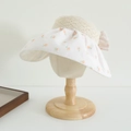 Detalle del sombrero de sol para niña con estampado floral naranja y lazo de encaje - 52cm (3-6 Años) / Naranja