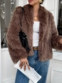 Women's casual brown fuzzy long-sleeve coat styled with jeans in a street fashion look - S / Brown