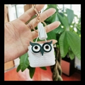 White owl bag charm and keychain with golden clasp and tassel accessory - White