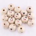 20mm natural wood beads with winking smiley face pattern for jewelry making - Left Eye Closed