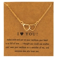 Golden minimalist double heart necklace presented on a sentiment gift card - KC Gold Double Heart with Card (1660)