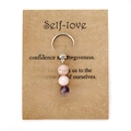Handmade stone keychain with rhodonite, amethyst, and rose quartz on self-love card - Self-love (3617)