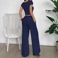 Donkerblauwe gebreide tweedelige set met top met korte mouwen en wijde broek rugaanzicht - S / Marineblauw