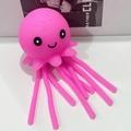 Jouet pieuvre rose en silicone avec visage souriant pour le bain et soulagement du stress - Nouveau Modèle Poulpe Méduse Rose