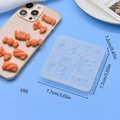 Silicone mold for heart and bow candies featuring orange resin finished pieces - Square Candy & Bowknot Style (2)