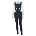 Close-up of black slim fit jumpsuit featuring sexy symmetrical side waist cut-out details - S / Black