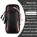 Fascia sportiva da braccio nera a quadri con cerniere rosse per telefoni fino a 6,5" - Fascia da Braccio a Pois Rosso