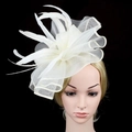 Vintage mesh fascinator hat with feathers on model head, elegant cream wedding hair accessory - Beige