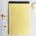 Classic yellow legal pad notebook with black top binding and red margin lines - A5 / Yellow