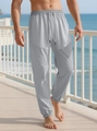 Detalle del tejido gris con textura de rejilla en pantalones deportivos de hombre con cordón - S / Gris