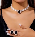 Close-up of triple-layer pearl necklace and earrings with black oval pendant on model - 7# Set—Oval Black