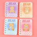 Mini A7 spiral notebooks featuring cute bear designs in purple, orange, blue, and pink - Heart Bear