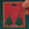 Festive green glitter Christmas tree earrings displayed on a red checkered card - Green Glitter Tree (11048)