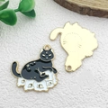 Halloween black cat enamel pendant charm with golden metal finish and white base detail - Cat on Skull (28x27mm)