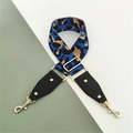 Detail of leopard print wide bag strap with black leather ends and gold hardware - Sky Blue